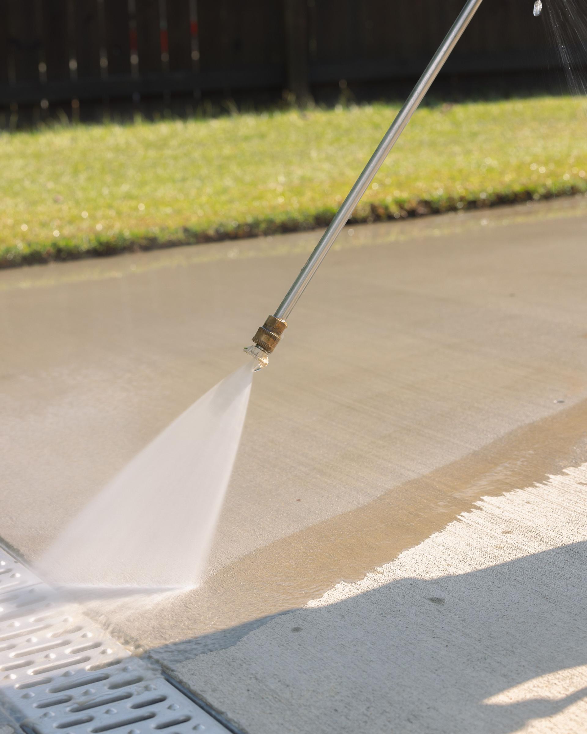 Pressure Washing Driveway - Fence Grass Drain - Vertical