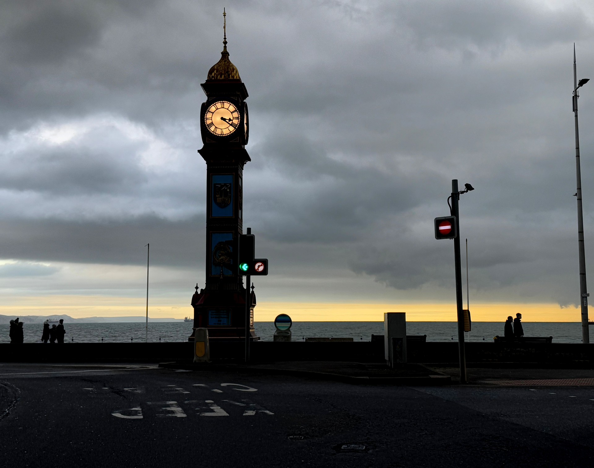 Clock tower at dusk on the promenade